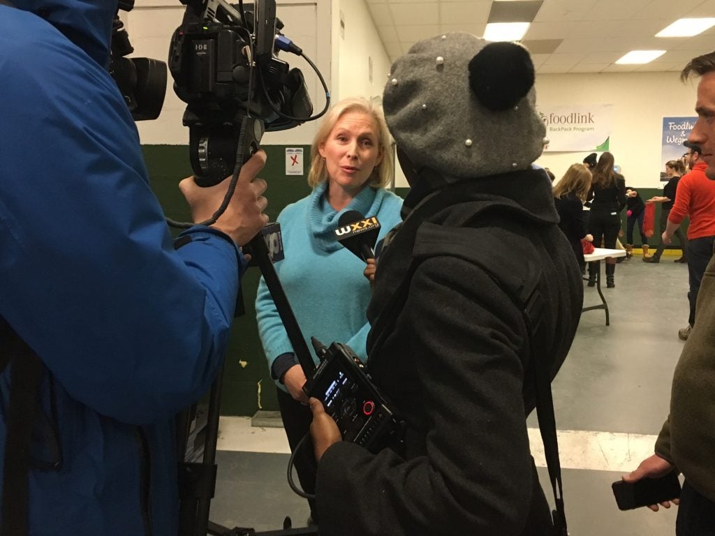 Sen. Gillibrand speaks to the media Dec. 16 at Foodlink. 