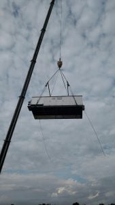 The crane at work on Aug. 4 at Foodlink.