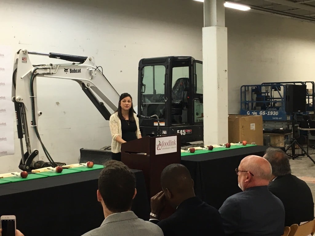 Executive Director Julia Tedesco gives her remarks at the May 11 groundbreaking at Foodlink.