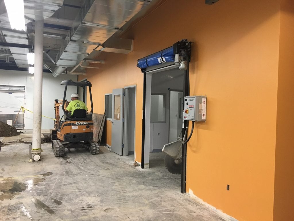 More orange, and one of many high-speed doors in the Community Kitchen.