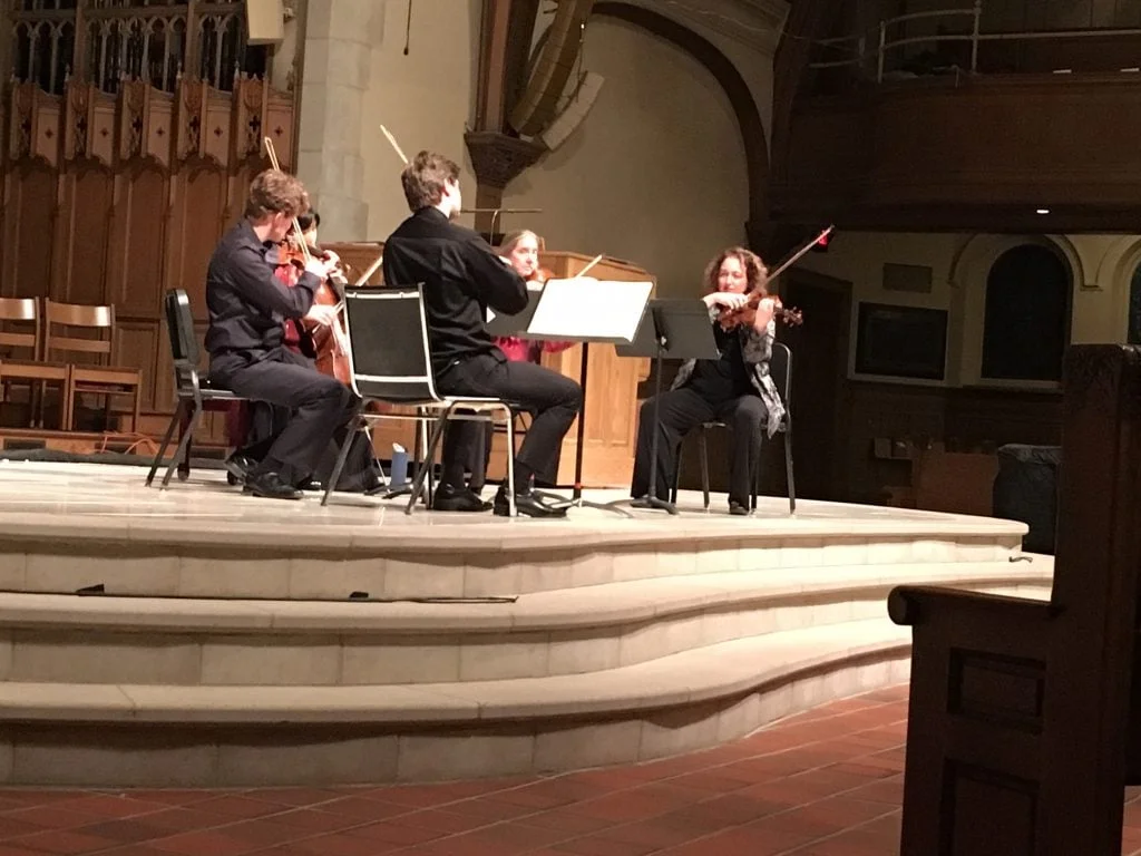 Violist Carol Rodland, right, and a string quintet perform Sunday night. Rodland has organized If Music Be the Food for the past eight years.