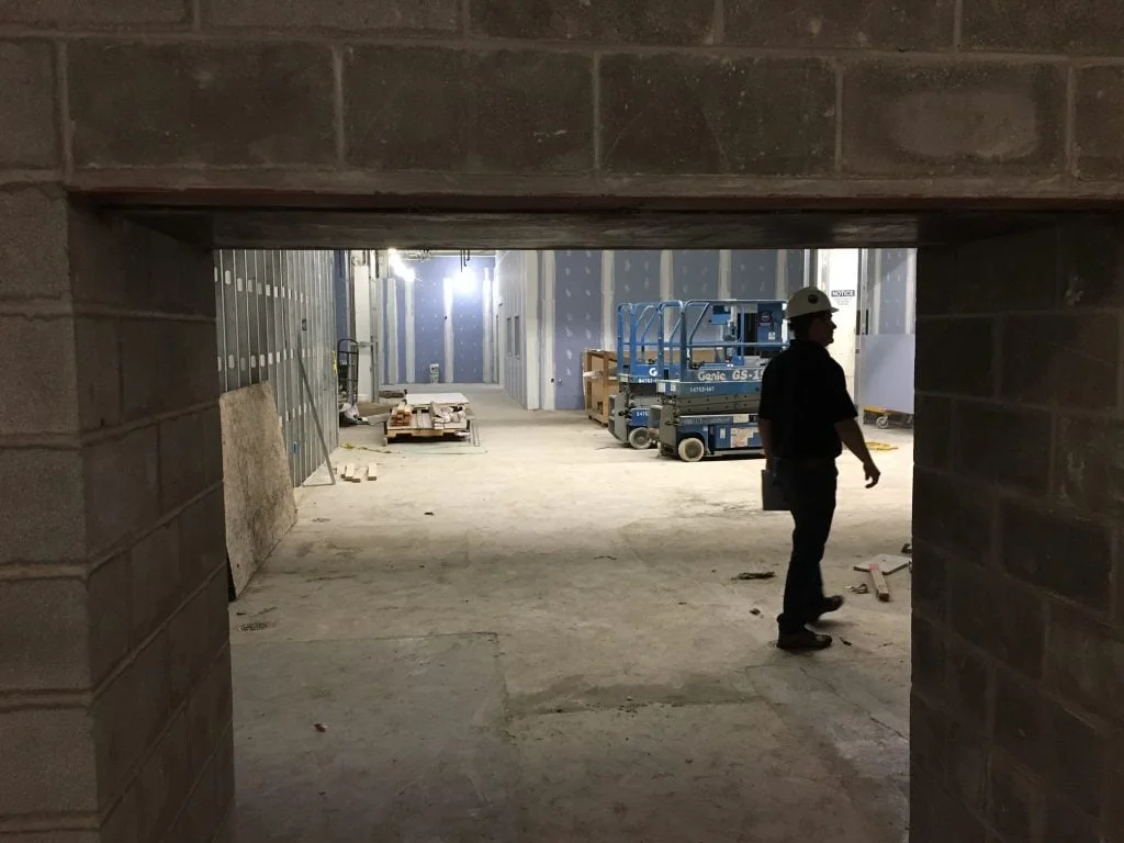 The opening in this wall is where apples will enter our Community Kitchen. 