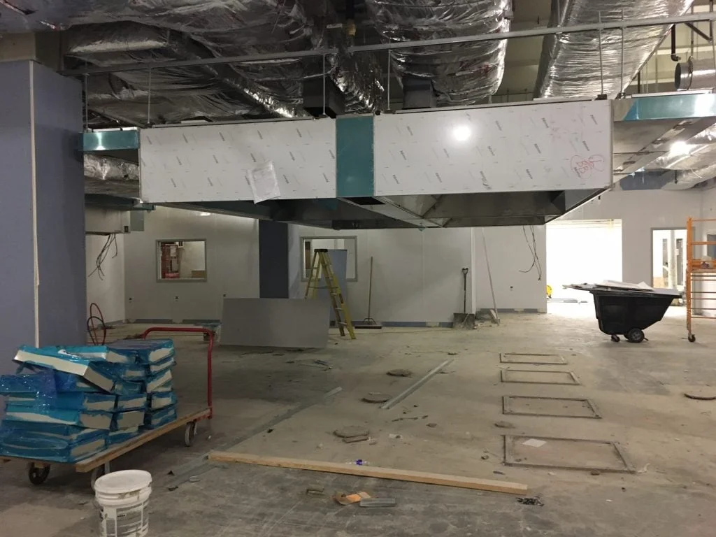 The ventilation hoods have been installed in the main kitchen area.
